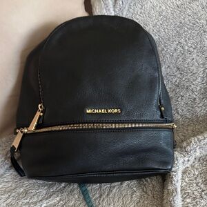 Michael Kors Black Leather Backpack with Gold Zippers